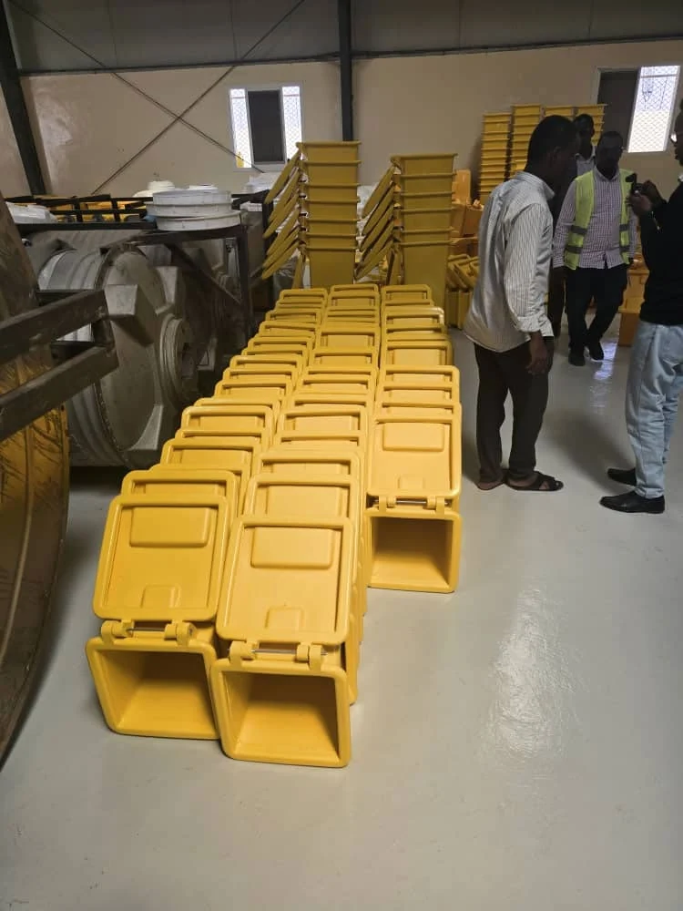 Yellow plastic waste bins manufactured by Diamond Plastic Industries